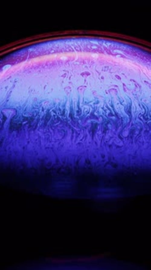 Extreme Close Up of Iridescent Soap Bubble with Colors