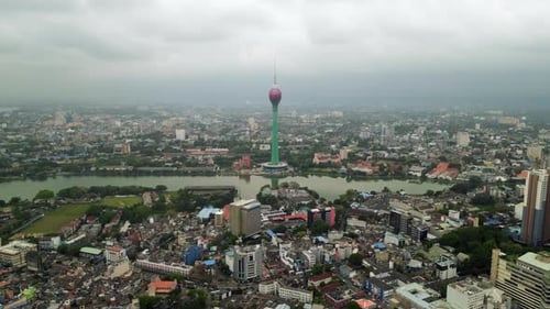 Aerial Footage Over Colombo Skyline Featuring the Lotus Tower Amid Modern and Historic Architecture