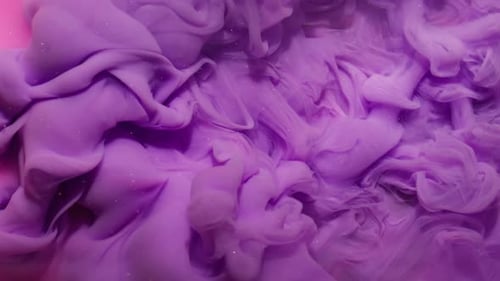 Purple Ink Slowly Spreading in Pink Water
