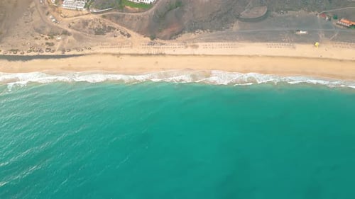 Summer seascape beautiful waves, blue sea water in sunny day. Esquinzo beach, Spain, Canary Island T