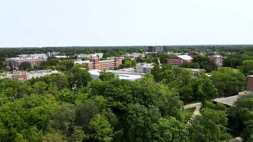 Panning left in the air over the central area of Michigan State's Campus.