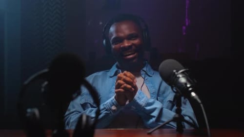 Stylish Young Adult Recording Podcast in Studio