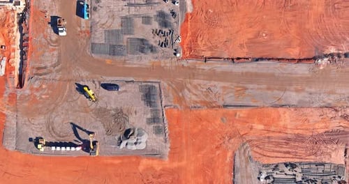 Construction Site Aerial View with Heavy Equipment