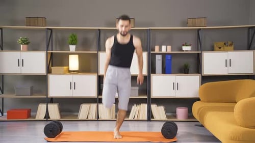 Young male athlete stretching his whole body.