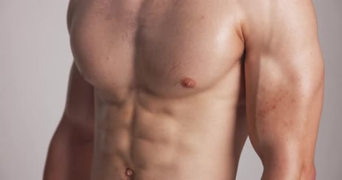 Fitness, muscle or man in studio with closeup, wellness or motivation for body transformation