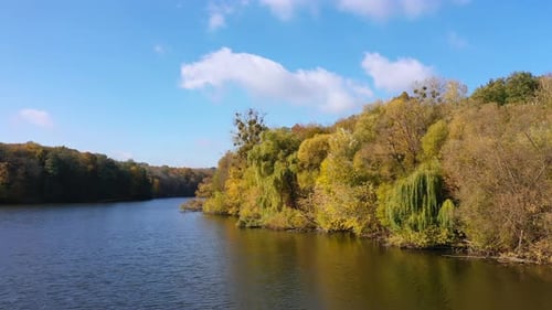 Beautiful autumn river scneries. Aerial view of seasonal outdoor landscapes.