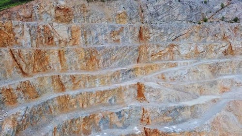 Natural Quarry is Located Near Road Against Backdrop of Rhodope Mountains and Hills with Forests and