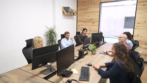 Team Collaboration at Modern Office Conference Table