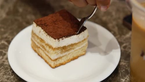 Enjoying a Delicious Dessert at a Cozy Cafe