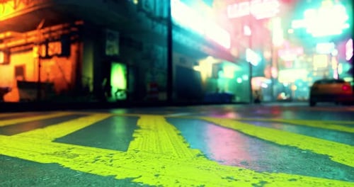 Vibrant Urban Street at Night with Neon Lights and Yellow Crosswalks
