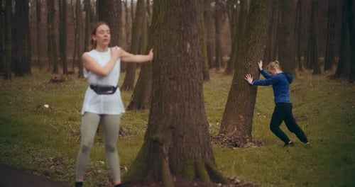 Two Woman Workout Exercising In Park Jogging Fitness