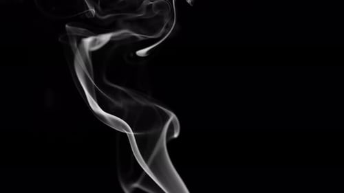 Wispy White Smoke Flowing on Black Background