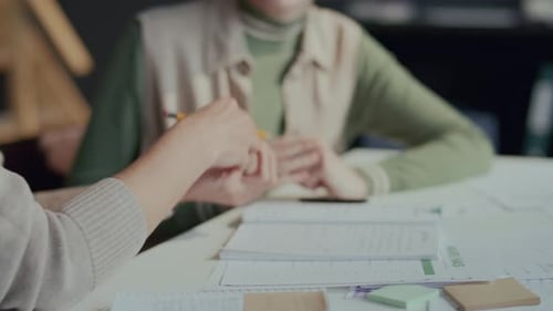 Women Collaborating in a Modern Workplace Environment