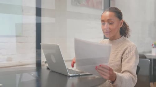 Excited Woman Gets Good News at Work