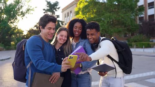 Multiracial Group of University Students Taking a Selfie on Campus