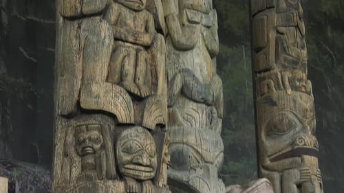 totem pole close up pan from bottom to top in museum native indian displays 4k