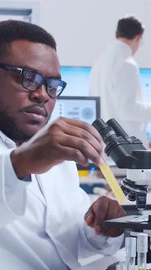 Scientific Laboratory Filled with Various Research Equipment Scientists are Conducting Experiments