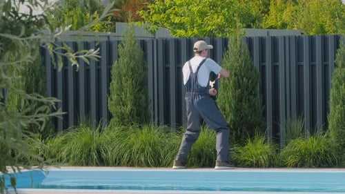 Cheerful Gardener Dancing with Garden Shears Making Fun of Himself at Work
