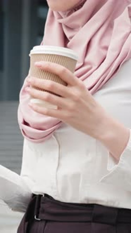 Vertical Screen Close Up of Muslim Woman in Hijab with Modern Smartphone and