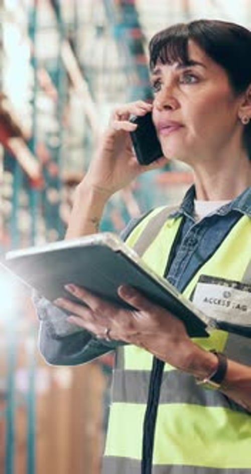 Logistics, phone call or happy woman with tablet in warehouse, shipment coordination