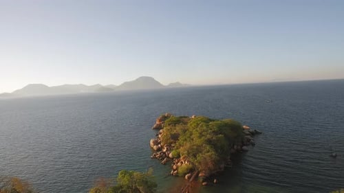 Luxury island resort and rustic bungalows on exotic lake malawi aerial view