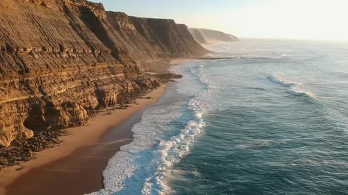 Rugged Coastal Cliffs Powerful Ocean Waves Hitting Secluded Beach Shore