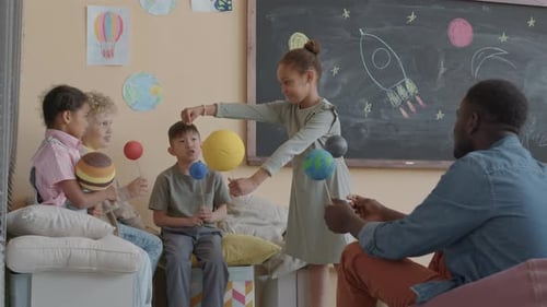 Primary School Students Playing on Astronomy Lesson