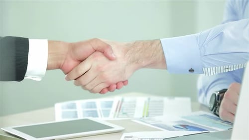 Dynamic Business Handshake in a Modern Office Setting