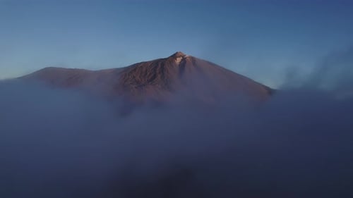 Mountain range in dry deserted landscape of Teide National Park. Scenery of highest volcano
