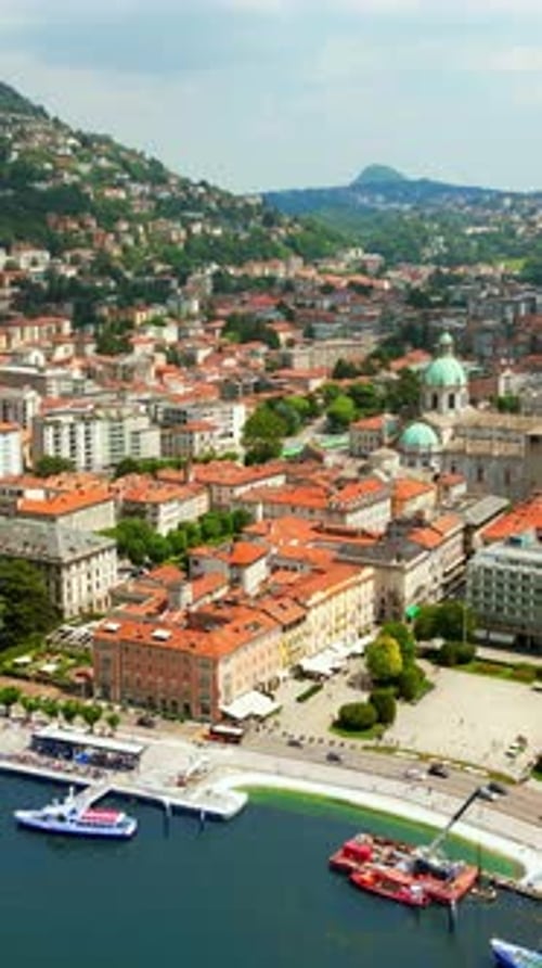 Aerial, drone view of Como, Italy on the shore of Lake Como. Vertical