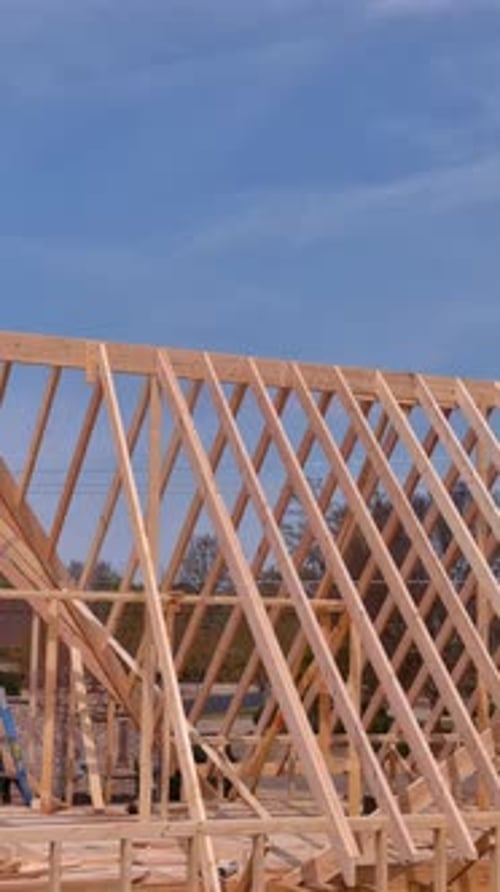 Using Wooden Frame Trusses to Support Beams for Construction of a New Roof for House