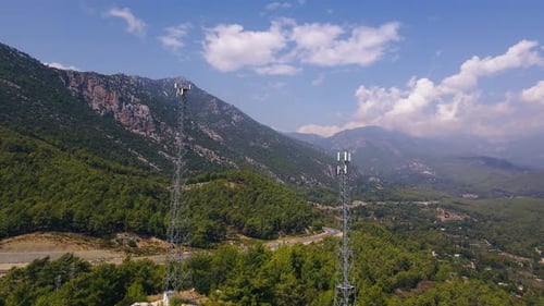 Aerial View of 5G Telecommunication Towers Standing Tall on Mountains