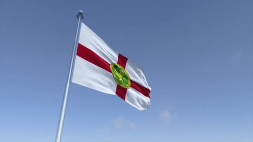 Realistic Alderney Flag Waving Against Blue Sky