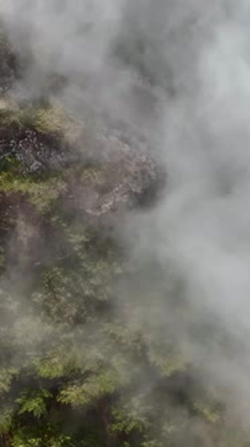 Vertical Video Cloudy Landscape in the Mountains Aerial View