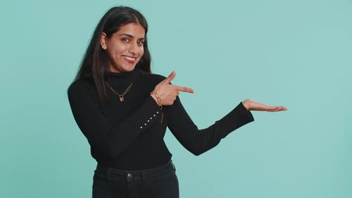 Indian Woman Showing Thumbs Up Pointing Empty Place Advertising Area for Commercial Text Copy Space