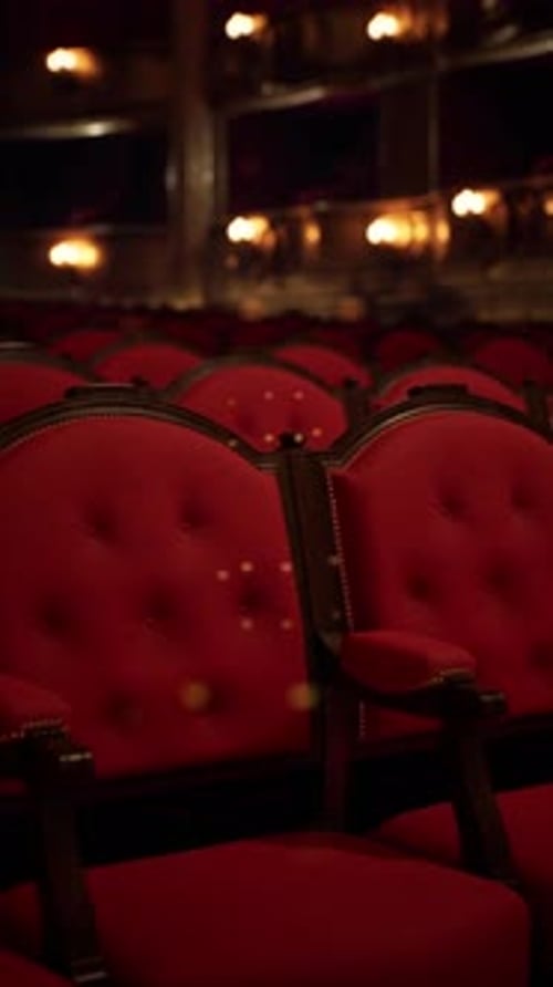 Empty Red Seats Await the Operas Performance in a Grand Theater