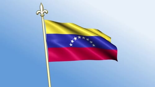 Waving Venezuela Flag with Golden Pole Against Blue Sky