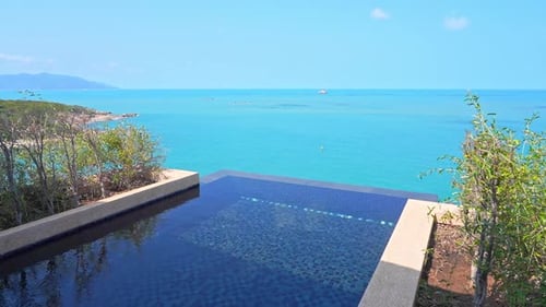 Infinity Swimming Pool of Private Villa Above Caribbean Sea, Tropical Vacation Concept