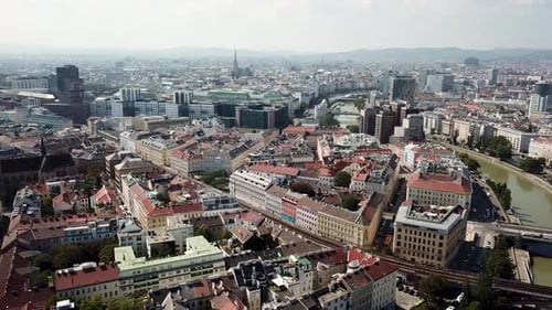 Danube River with old town of Vienna and modern downtown in background. Office buildings in capital
