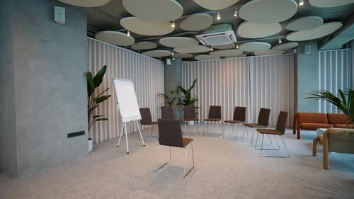 Empty Modern Meeting Room with Circular Chair Arrangement