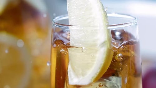 Refreshing Drink with Lemon and Mint Sprig