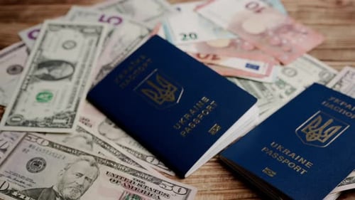 Close Up Shot of Person Identity Document Money Usa Dollars Euro Bills Scattered on the Table and