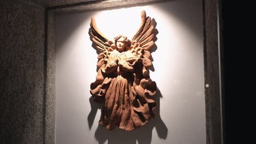Terracotta Statue of Angel Mounted on Wall