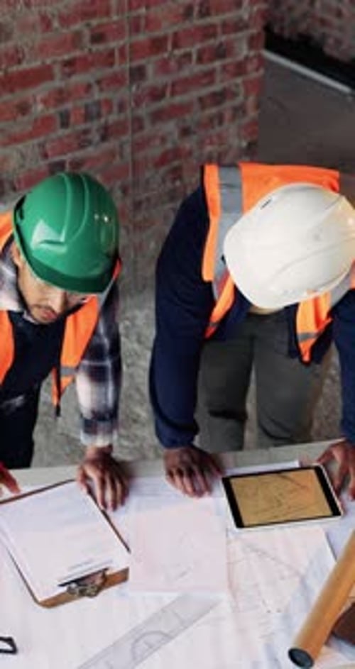 Construction, tablet and men with checklist on blueprint for building tasks, compliance and above