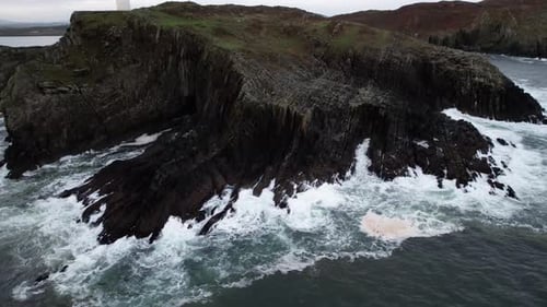 Aerial View of Atlantic Ocean Waves Crushing on Scenic Irish Coastline at Moody Autumn Day, Drone Sh
