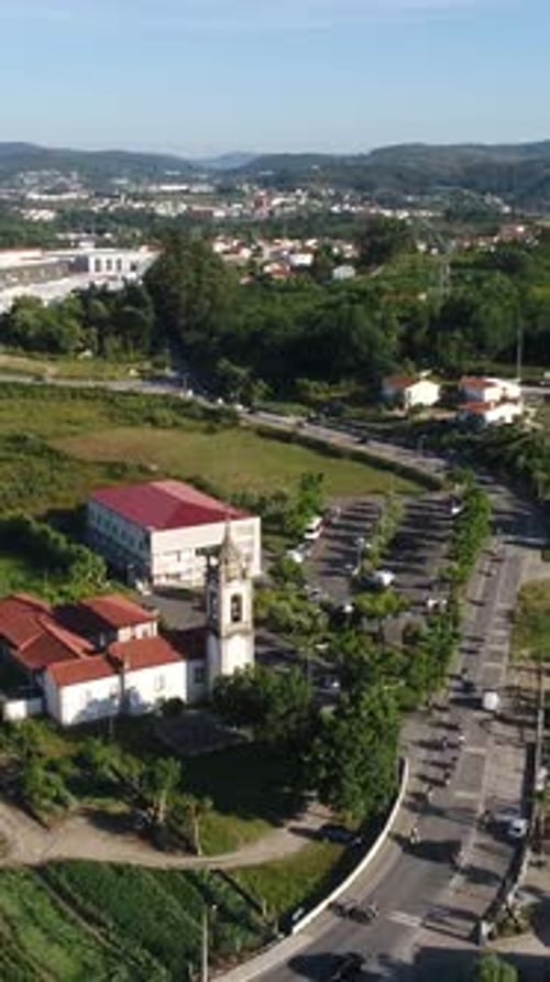 Aerial View of Village by Urban Landscape