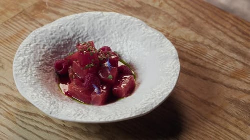 Cubed Tuna Fillet Seasoned with Sauce in Plate for Serving in Restaurant