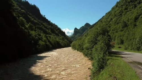 Rapid Mountain River and Mountains