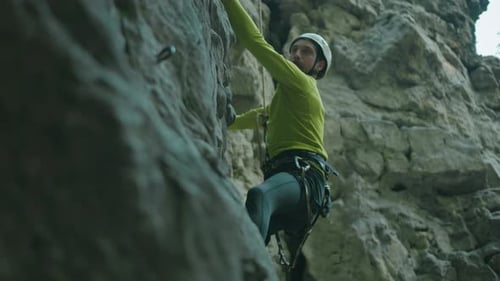 Fit Flexible Guy Young Sportsman Bearded Alpinist Climbing Mountain Rock Stone Cliff Alone