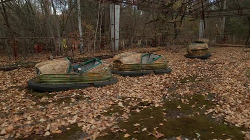 Decayed Autodrome with Bumper Cars in Ghost Town Pripyat in Radioactive Chernobyl Exclusion Zone